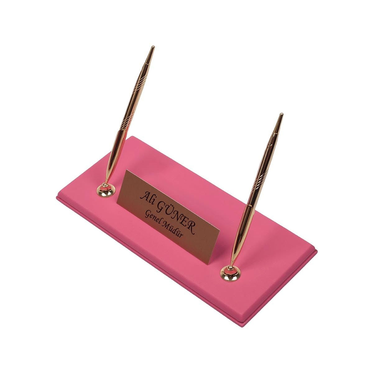 Pink desk nameplate base with two gold-tone pens and a personalized gold-tone plate