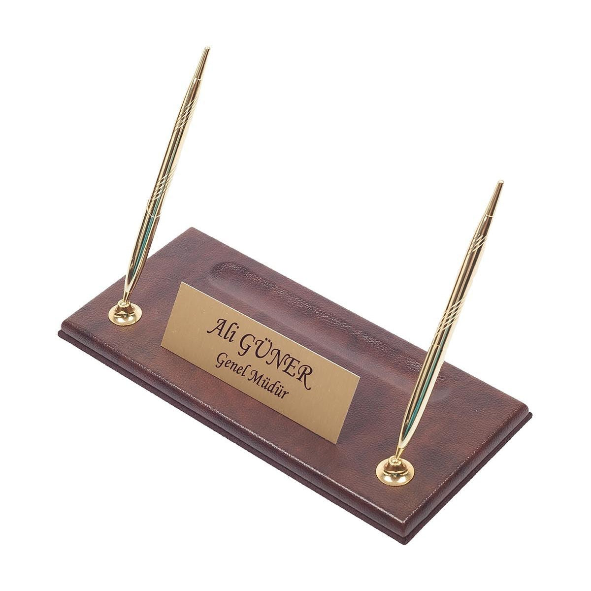 Brown desk nameplate base with two gold-tone pens and a personalized gold-tone plate