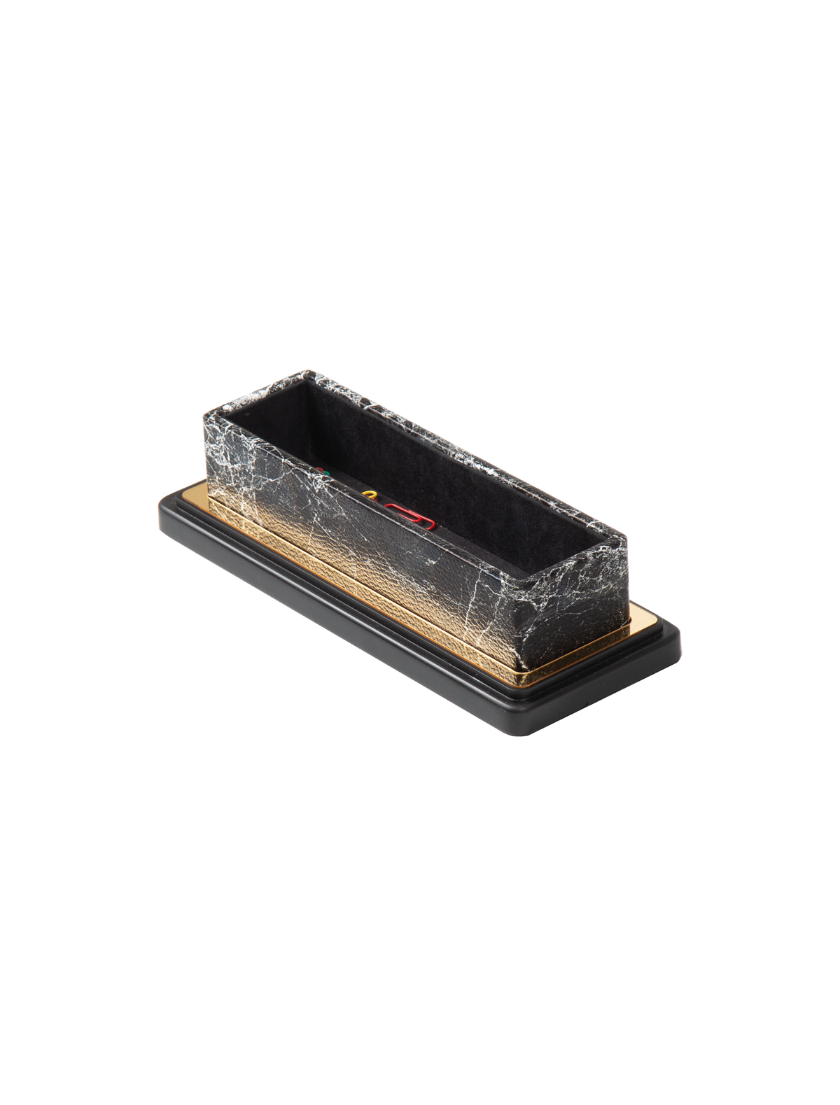 Gray marble-pattern paper clip tray with gold-colored trim and a black base, shown holding clips.