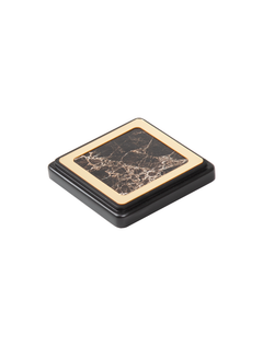 Square dark marble-pattern coaster surrounded by gold-colored trim on a black base.