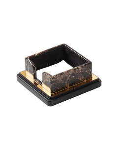 Square dark marble-pattern memo holder with a front opening and gold-colored base trim.